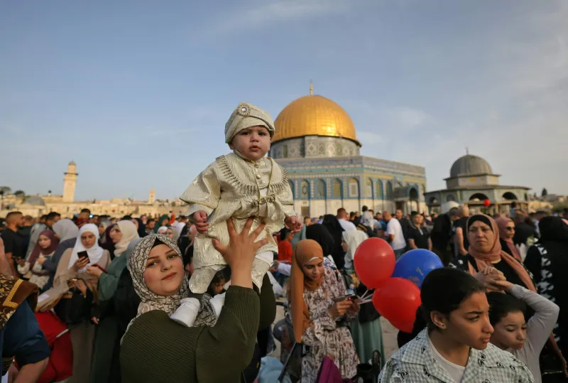Around the world, nearly 200 million Muslims are celebrating Eid al-Fitr, with Palestinians standing among the rubble