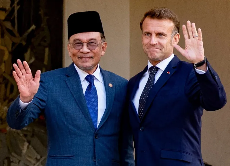 Malaysian PM Anwar and President Macron call for Gaza ceasefire, hostage release, and uninterrupted humanitarian aid