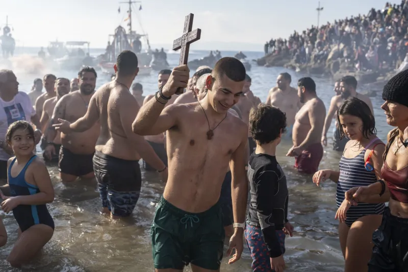 Winter Spiritual Festival in Bulgaria, Wooden Cross Thrown into the Ice-Covered Lake - Believers Jump into the Water